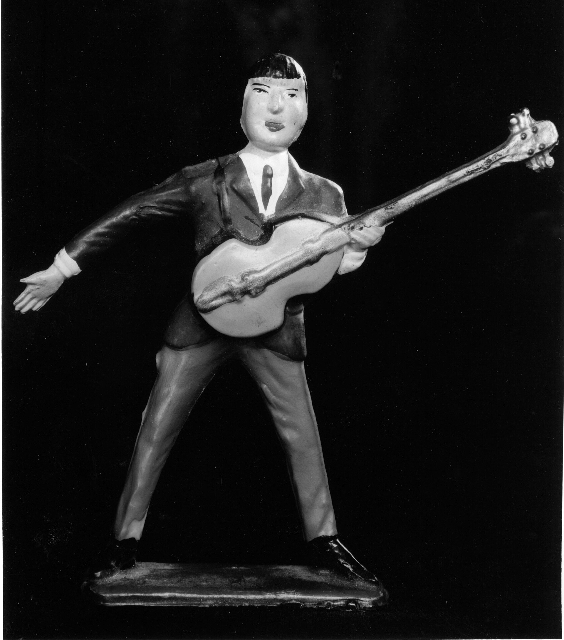 Bass guitar 2.5MB the artist plays base 4x5 poloroid, by Christopher Flach