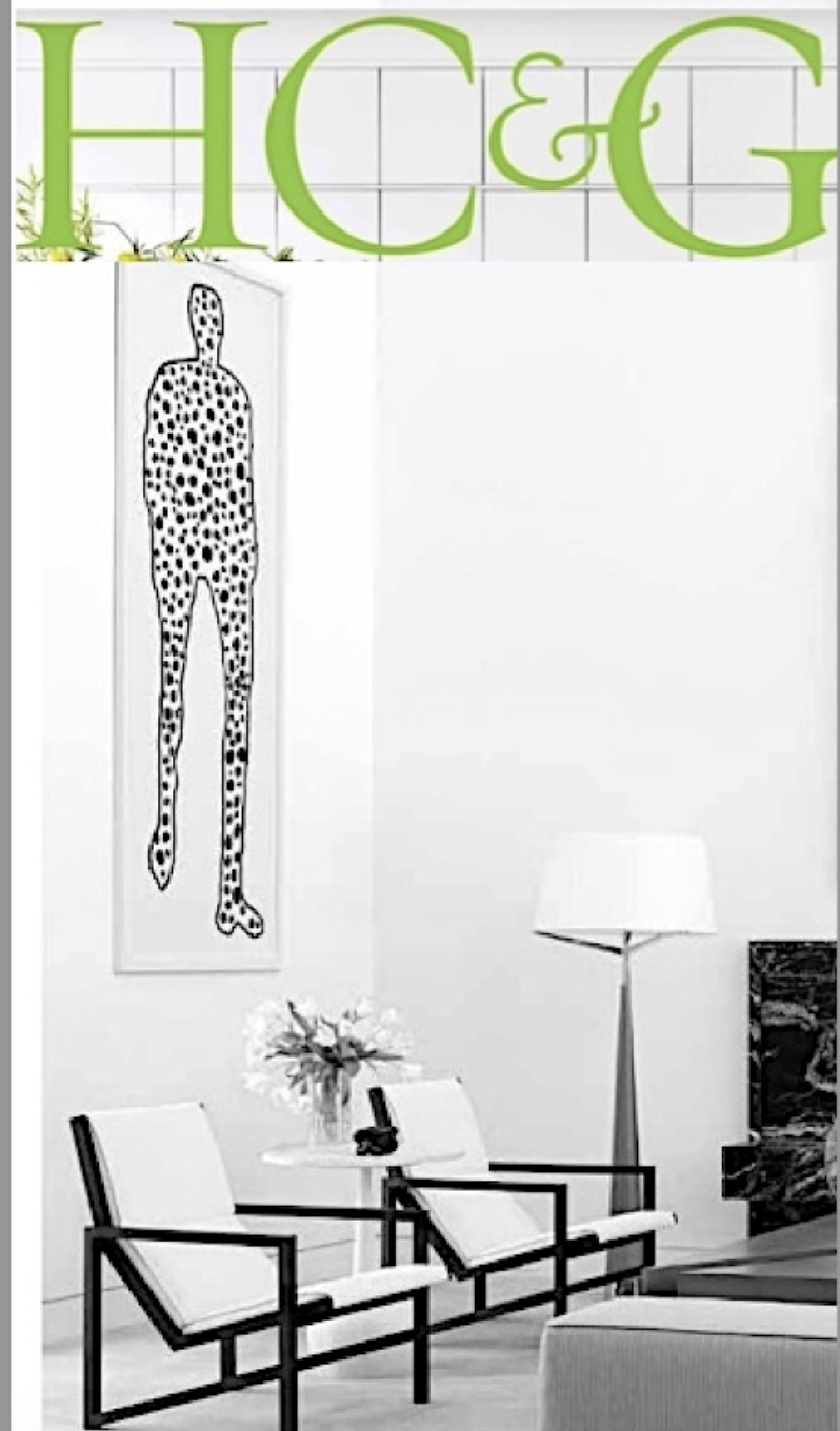 Christopher Flach's spotted figure drawing on the wall of a Water Mill living room in Hamptons Cottages & Gardens, 2021